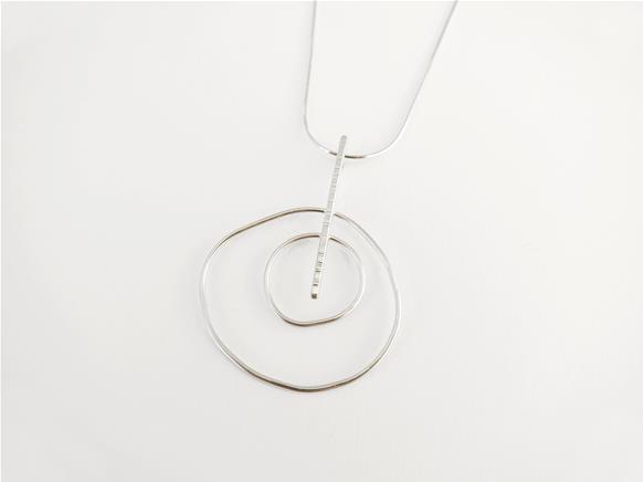 Double uneven circle pendant in sterling silver